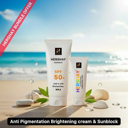 Two tubes of Hershay sunscreen on a beach with a clear sky.

